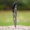 True Utility Skeletonknife, TU571K, 4 cm rozsdamentes acél penge, eloxált alumínium tok, karabiner rögzítési pont, jobb és balkezes